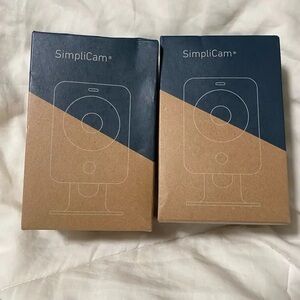 Set of 2 SIMPLICAM motion detector security surveillance cameras by SIMPLISAFE.
